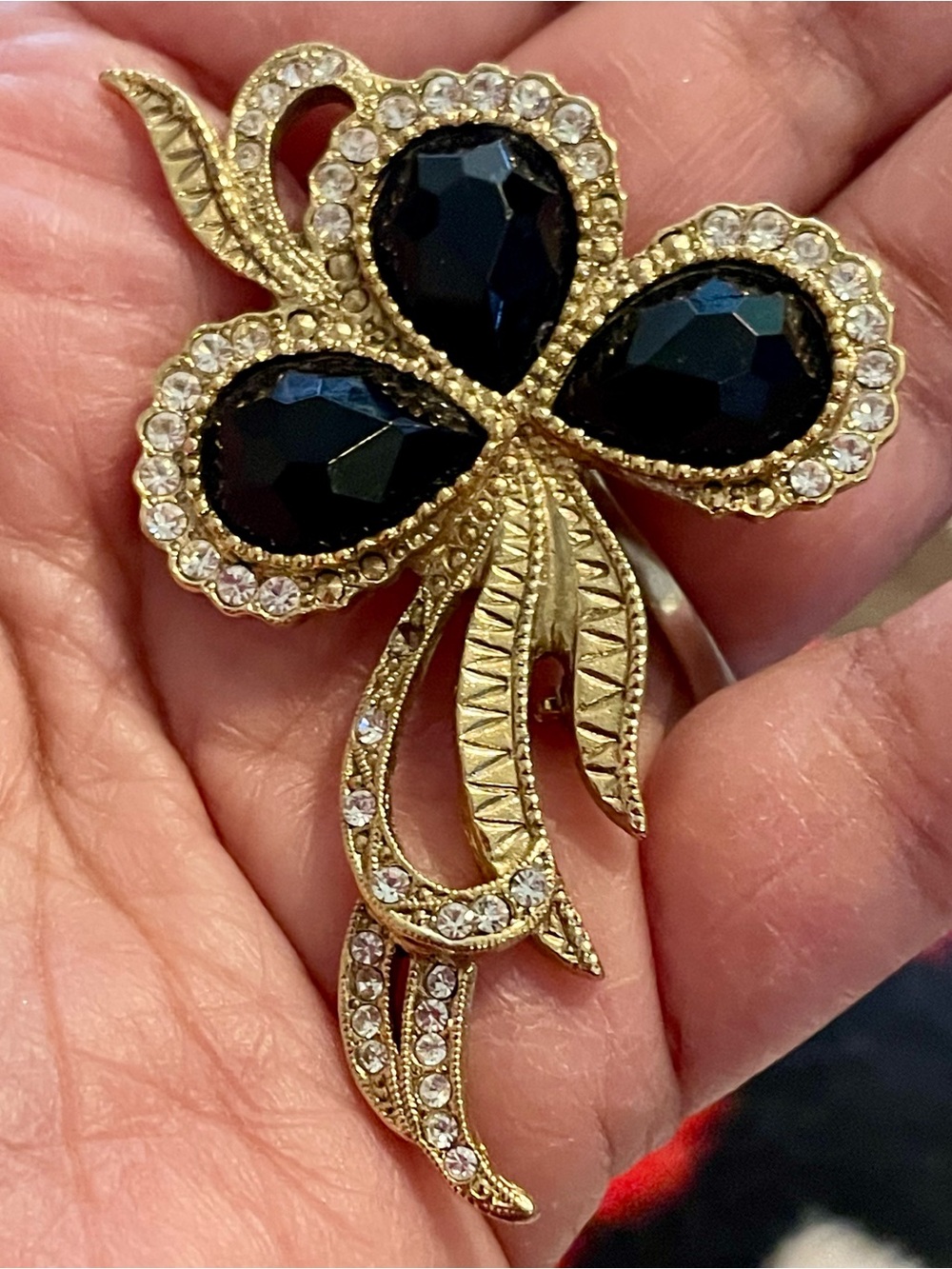 1928 Gold-Tone Floral Brooch with Black Stones and Clear Crystals